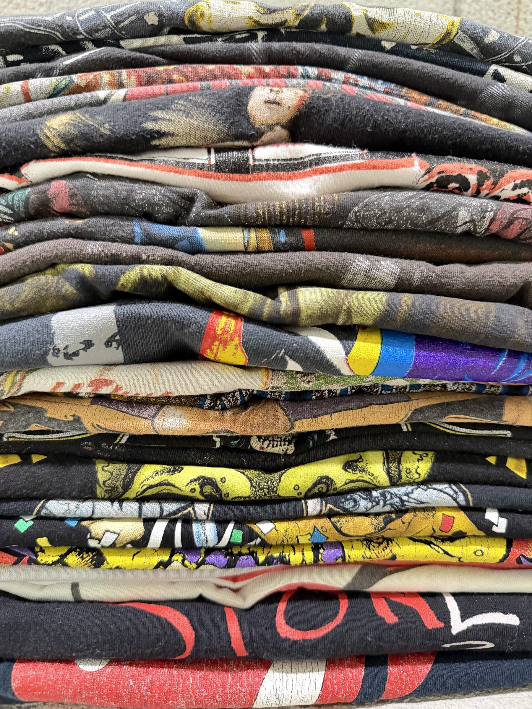 perhaps cover photo: a stack of vintage T-shirts